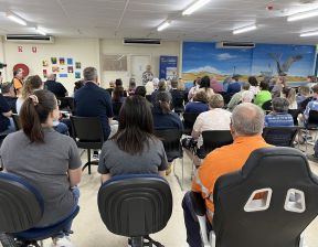 Group of people sitting on chairs