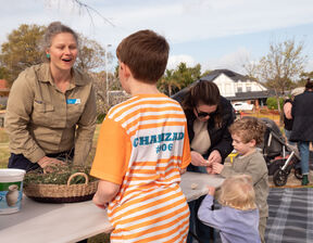 Small kids standing and talking to each other