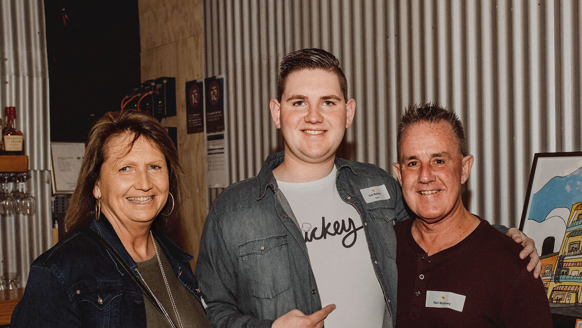 Josh Maloney with his parents