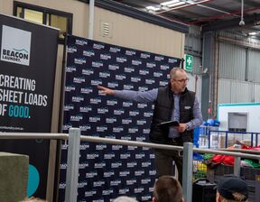 Man presenting to an audience